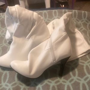 White knee high boots